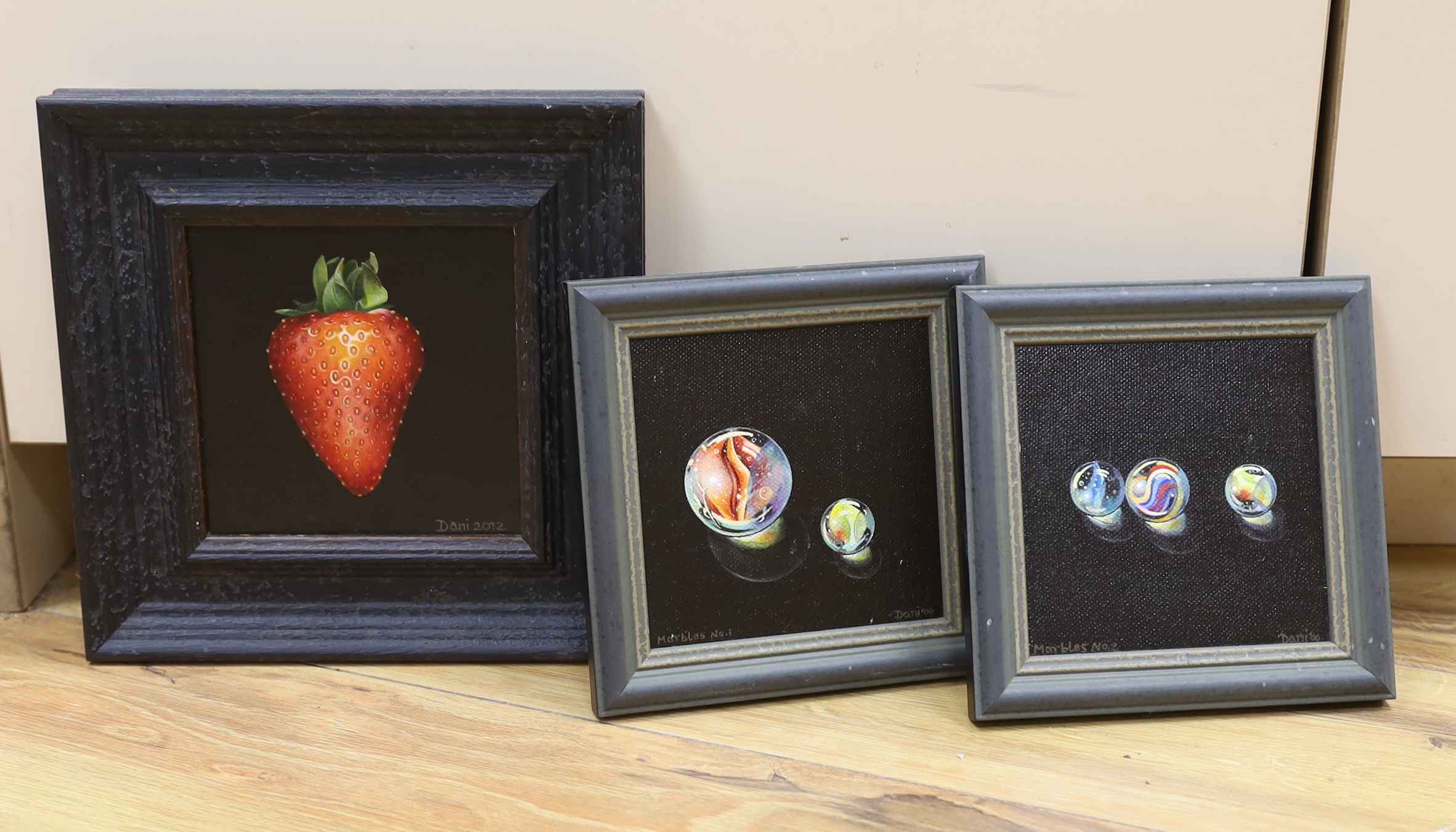 Dani Humberstone (contemporary) three oils on canvas board, Still lifes, 'Big red strawberry', 'Marbles No1' and 'Marbles No2', each signed and dated, largest 12 x 11cm
